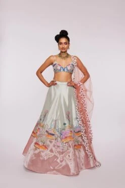 Ivory And Peach Divergence Tissue Appliqued And Embellished Mk Lehenga Set